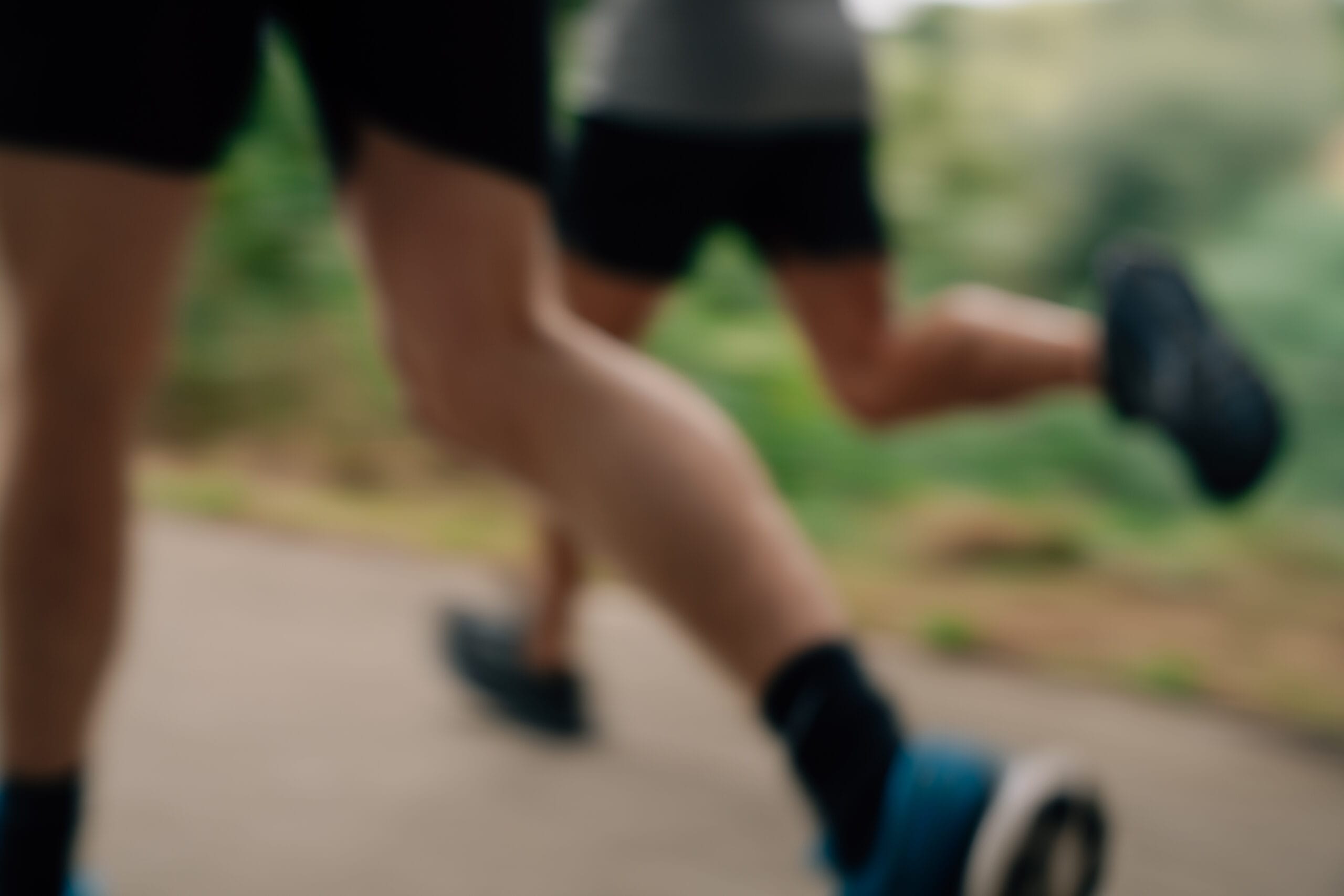 close up out of focus shots of running mens legs