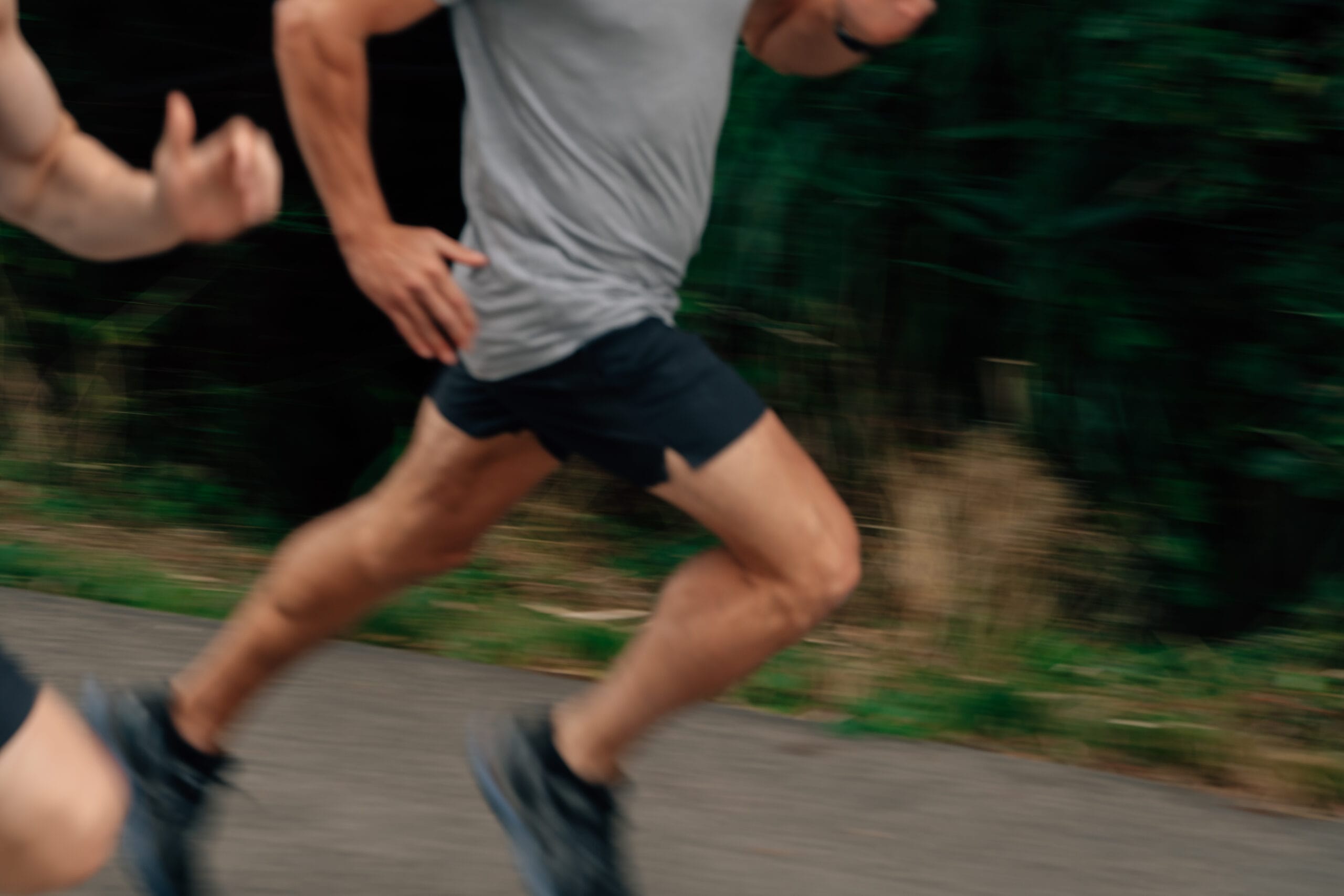man's legs running close up