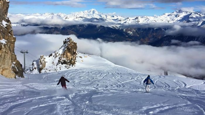 skiing on winter mountains